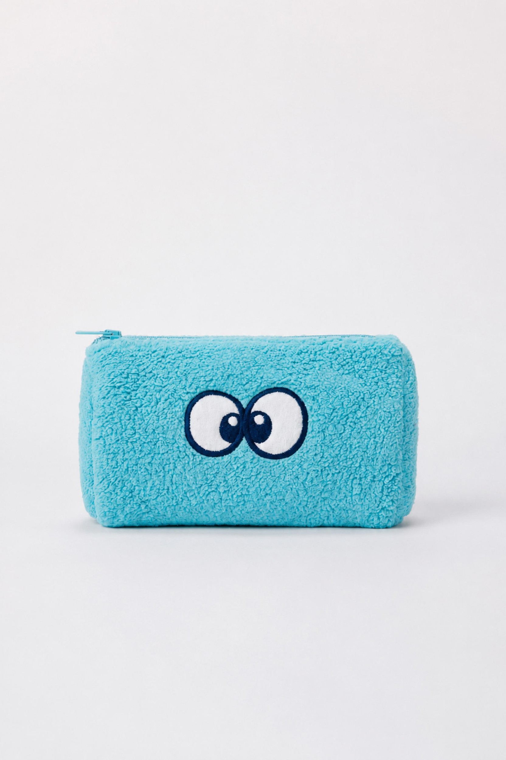 Blauw zakje van zachte teddystof