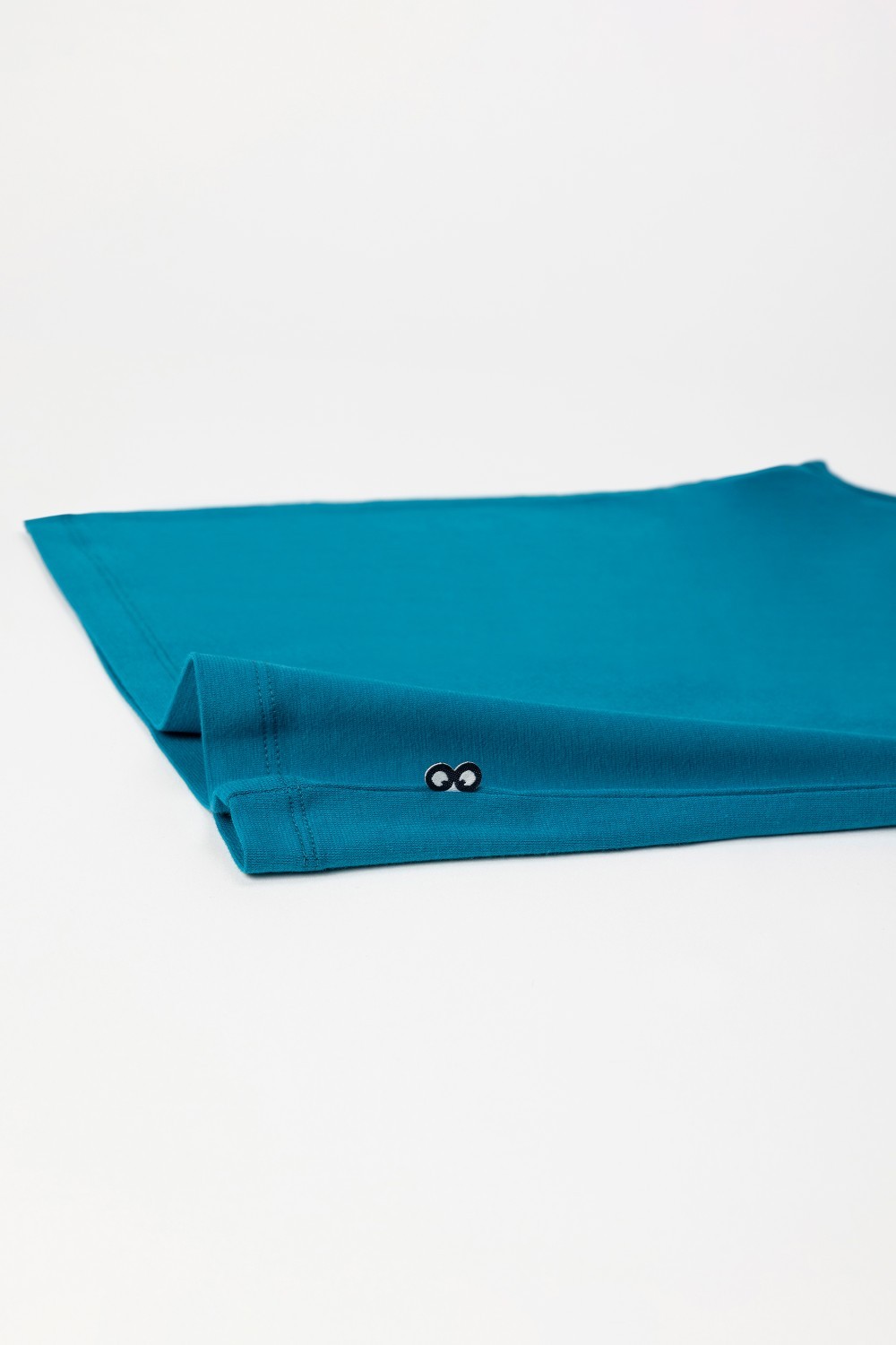 Groenblauwe singlet in rekbaar katoen